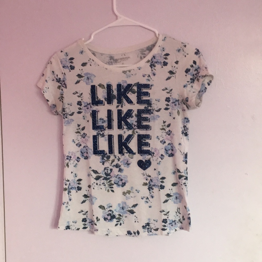 An Arizona Jean Co. glittery blue floral shirt